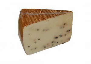 Auricchio Pecorino Calcagno pepper is produced in large wheels of 15 kg and is available with black pepper.