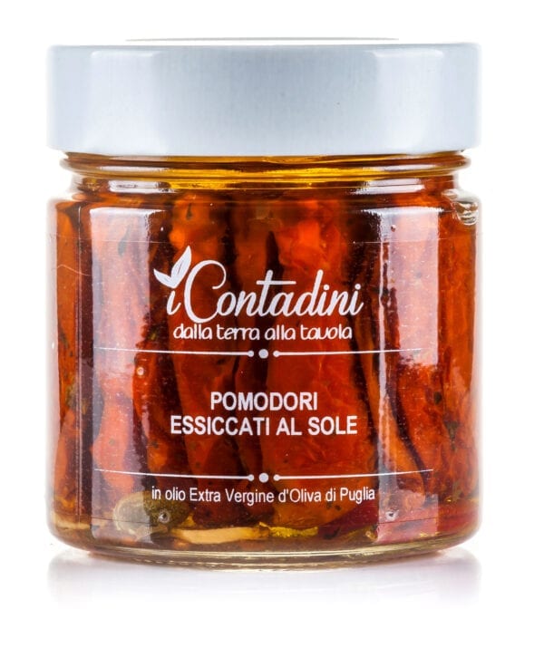 I Contadini long sun-dried tomatoes. Seasoned with Mediterranean spices and covered with extra virgin olive oil.