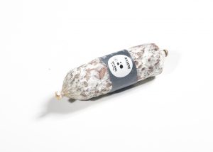 Salcis mini truffle salami. Usually made with pork meat which is minced, seasoned and stuffed in natural or specially made casings.