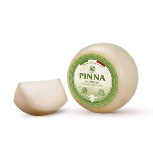 Pinna capretto sardo dolce. It is sweet and compact. Capretto is a soft cheese with few eyes, ivory-white in colour.
