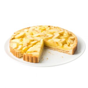 Apple cake proportioned. Short crust pastry base filled with apricot jam, custard cream, sponge cake and apple; covered with gelatine.