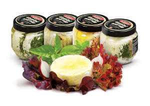 tomini cheese with chilli in jars